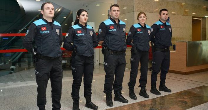 Pasaport polislerine turkuaz yelek